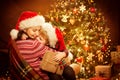 Christmas Family and Xmas Tree, Happy Mother give Baby Child New Year Present Gift