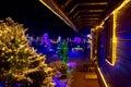 Christmas fantasy - wooden house in lights