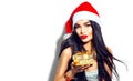 Christmas fashion model girl holding golden gift box Royalty Free Stock Photo