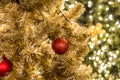 Christmas festival in Bangkok. Golden Christmas tree with red b