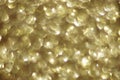 Christmas festive background. Abstract shiny gold defocused glitter bokeh Royalty Free Stock Photo