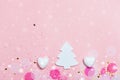 Christmas festive banner background: white christmas tree and confetti with sparkling glitter and stars. Royalty Free Stock Photo