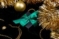 Christmas festive black gift boxes with green ribbon