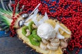 Christmas festive pineapple cut in half with a scoop of ice cream