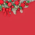 Christmas Festive Red Background Border with Tree Decorations Royalty Free Stock Photo