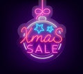 Christmas festive sale of a poster in a neon style. Vector discount card, neon sign, bright banner, luminous sign, neon Royalty Free Stock Photo