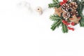 Christmas festive styled composition. Decorative banner. Pine cones, fir tree branches, red rowan berries, wooden stars