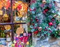 Festive and seasonal window display as Christmas time in a shop in the town of Bakewell