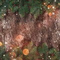 Christmas Fir branches on wooden background. Xmas and Happy New Year composition. Royalty Free Stock Photo