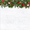 Christmas fir tree and berries on wooden white background Royalty Free Stock Photo