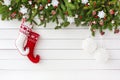 Christmas fir tree,Christmas socks on white wooden board background. Top view, copy space Royalty Free Stock Photo