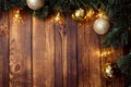 Christmas fir tree with decoration on dark wooden board Royalty Free Stock Photo