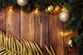 Christmas fir tree with decoration on dark wooden board Royalty Free Stock Photo