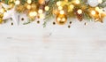 Christmas fir tree with decoration and glitters on wooden background Royalty Free Stock Photo