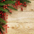 Christmas fir tree with decoration on a wooden board Royalty Free Stock Photo