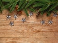 Christmas fir tree with decoration on a wooden board