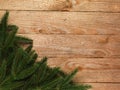 Christmas fir tree with decoration on wooden board background with copy space Royalty Free Stock Photo