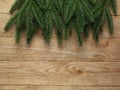 Christmas fir tree with decoration on wooden board background with copy space Royalty Free Stock Photo