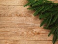 Christmas fir tree with decoration on wooden board background with copy space Royalty Free Stock Photo