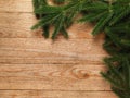 Christmas fir tree with decoration on wooden board background with copy space Royalty Free Stock Photo