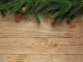 Christmas fir tree with decoration on wooden board background with copy space Royalty Free Stock Photo