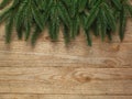 Christmas fir tree with decoration on wooden board background with copy space Royalty Free Stock Photo