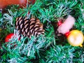 Christmas fir tree with pine cone and balls. Photo close-up in full screen Royalty Free Stock Photo