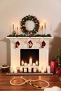 Christmas fireplace with Santa socks. Christmas stocking hanging from a mantel or fireplace Royalty Free Stock Photo