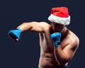 Christmas fitness boxer wearing santa hat boxing