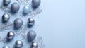 Christmas flat lay composition. Blue and silver balls , decorations, confetti on pastel blue background. Elegant, minimal style.