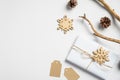 Christmas flat lay composition with eco-friendly decorations and gift boxes on white background. Zero waste, eco Christmas decor Royalty Free Stock Photo