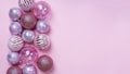 Christmas flat lay composition. Set of Christmas pink decorations, shiny balls on pastel background. Mock up for new year gretting