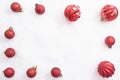 Christmas flat lay decoration frame on a white background. Red baubles with copy space Royalty Free Stock Photo