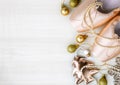 Christmas flat lay Pointe Shoes, tree, balls, star on white wooden background Royalty Free Stock Photo
