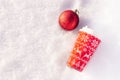 Christmas flat lay, redbauble and coffee cup. Royalty Free Stock Photo