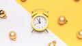 Christmas flat lay 2022. Retro style yellow clock in happy xmas midnight. Countdown to new year on happy xmas yellow Royalty Free Stock Photo