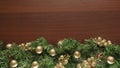 Christmas flatlay background with golden ornament decor and lights
