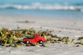 Christmas in Florida. A red truck carries a Christmas tree on New Smyrna Beach Royalty Free Stock Photo