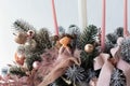 Christmas flower composition of spruce branches, cotton flowers, cinnamon, Christmas glass balls, ribbons and gray Ceramic owl for