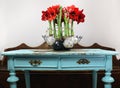 Christmas flowers on an old table. Royalty Free Stock Photo