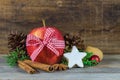 Christmas food, red apple, star cookie and aromatic spices Royalty Free Stock Photo