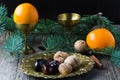 Christmas food still life: arabic dates, walnuts, spices Royalty Free Stock Photo
