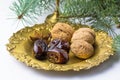 Christmas food still life: arabic dates, walnuts, spices Royalty Free Stock Photo