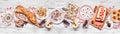 Christmas appetizers and sweet food table scene on a white wood banner background Royalty Free Stock Photo