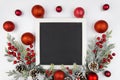 Christmas frame with christmas berry branches decorated with red balls. Flatly trandy mockup. Top view Royalty Free Stock Photo