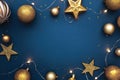 Christmas frame border with golden balls, stars, ribbon on blue background Royalty Free Stock Photo