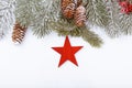 Christmas frame border on white, branches, cones and red star Royalty Free Stock Photo