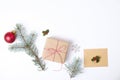 Christmas frame composition. Christmas gift,pine branch, red balls, envelope, white wood snowflakes, ribbon and red berries. Top v Royalty Free Stock Photo