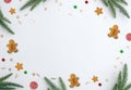 Christmas frame of fir branches and baubles on clean white background Royalty Free Stock Photo