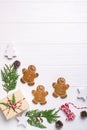 Christmas frame with gingerbread cookies, Christmas tree, pine cones, toys. Copy space for text. winter holidays. Royalty Free Stock Photo